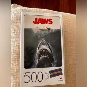 Jaws Movie 500-Piece Puzzle in Plastic Retro Blockbuster VHS Video Case.